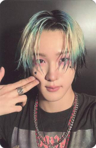 Photocard of Soul holding a finger gun to his cheek
