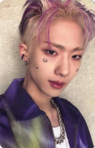 Photocard of Jiung wearing a purple and green button up over a white tshirt and looking into the camera