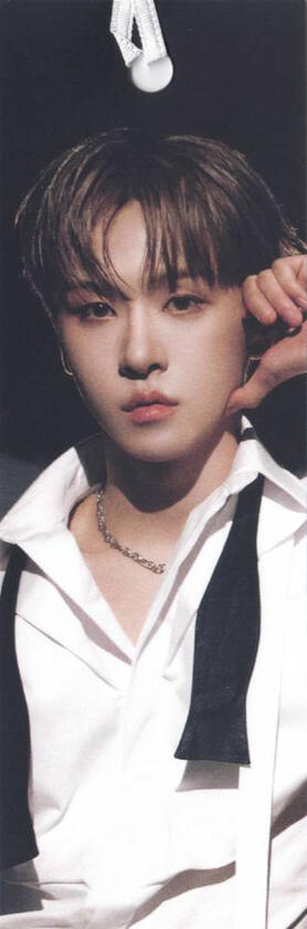 Bookmark of Yoojun wearing a white shirt and undone black tie while staring at the camera