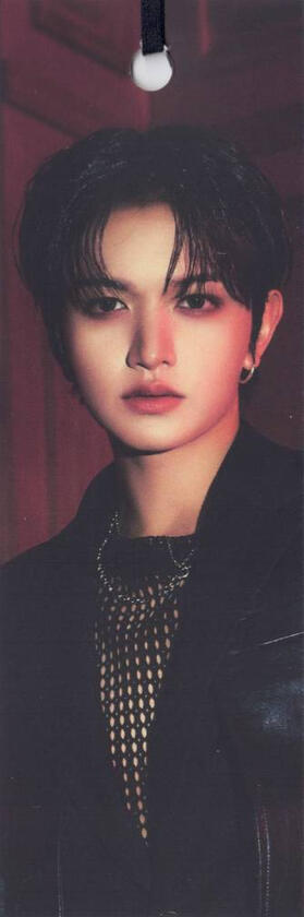 Bookmark of Bit wearing a black outfit and staring into the camera