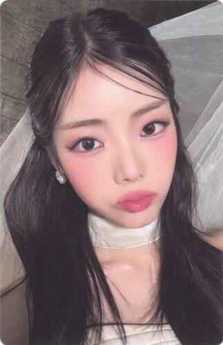 Photocard of Goeun wearing a burnt wedding gown