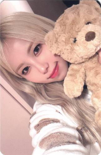 Photocard of Ireh holding a teddy bear