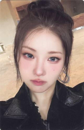 A photocard of Chaein on the On My Bike set