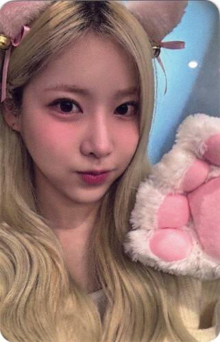 A photocard of Ayeon with cat paws and ears