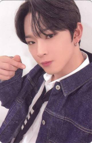 Photocard of Leedo wearing a denim jacket and making a finger heart