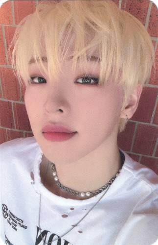 Photocard of Mujin wearing a white t-shirt