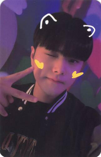 Photocard of Jahan making a peace sign with cat ears drawn on him