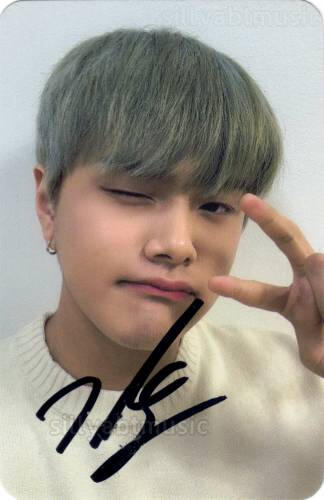 Signed photocard of Jahan winking and making a peace sign