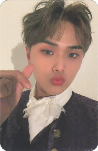Photocard of Jahan making a kissy face and finger heart