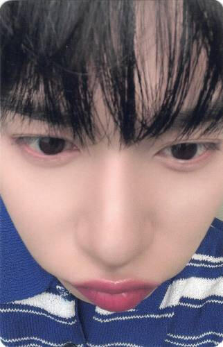 Photocard of a close up of Keonhee looking into the camera