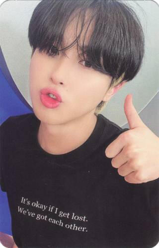 Photocard of Giuk making a silly face and a thumbs up