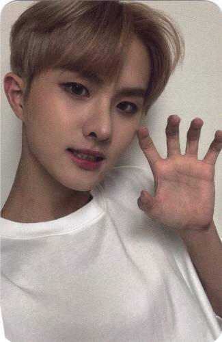 Photocard of Ivan making a clawed hand