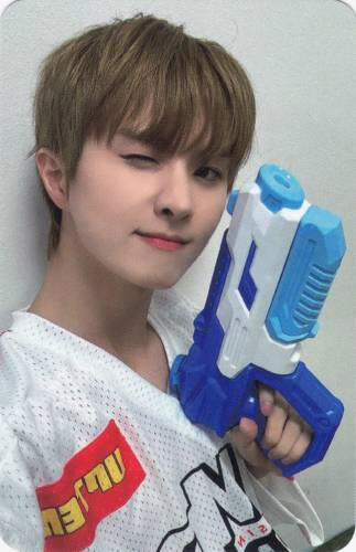 Photocard of Ivan winking and holding a water gun up