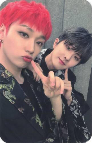 Photocard of Arthur and Ivan poking their cheeks