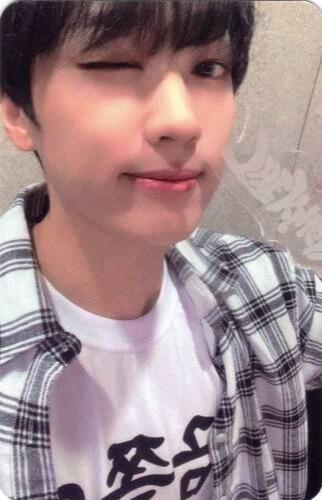 Photocard of Arthur wearing a flannel and white shirt and winking while holding the Realize lightstick