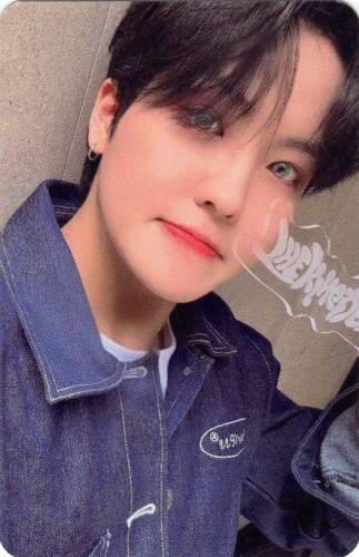Photocard of Louis wearing a denim jacket and holding the Realize lightstick