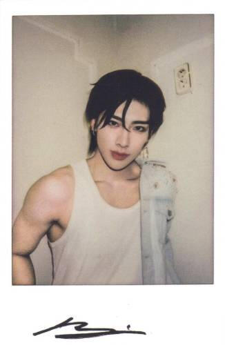 Fake polaroid of Ricky from Zerobaseone wearing a white tank top