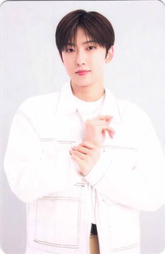 Photocard of Fuma standing and holding his wrist