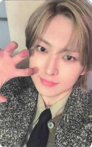 Photocard of Fuma wearing a cozy sweater and making a clawed hand