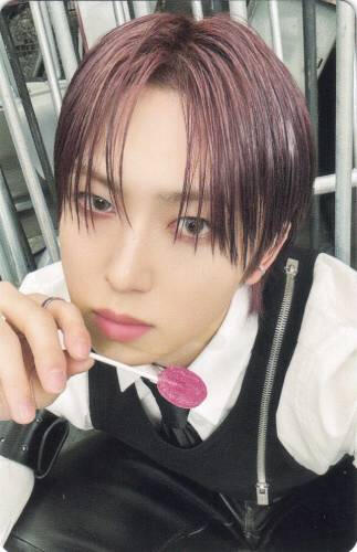 Photocard of Fuma holding a lollipop by his mouth