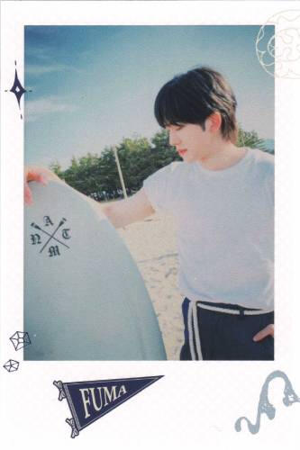 Fake polaroid of Fuma holding a surfboard