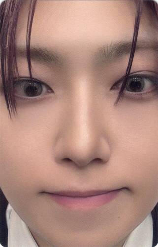 Photocard of Fuma really close to the camera