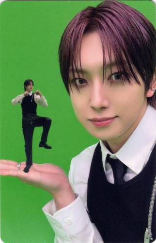 Photocard of Fuma holding a mini version of himself