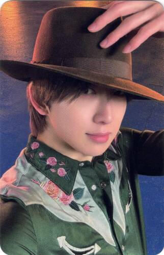 Photocard of Fuma holding a cowboy hat on his head