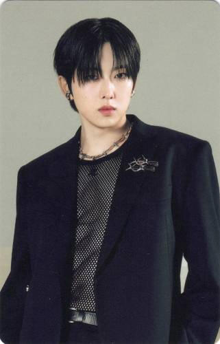 Photocard of Fuma dressed in all black with a mesh shirt and staring at the camera