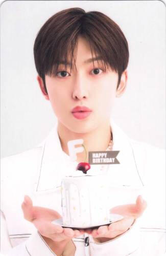 Photocard of Fuma holding a small cake up
