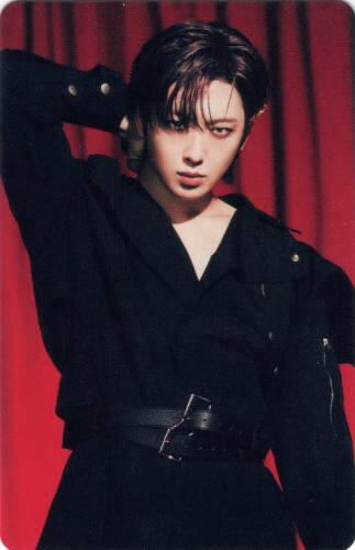 Photocard of Fuma holding the back of his neck and glaring at the camera