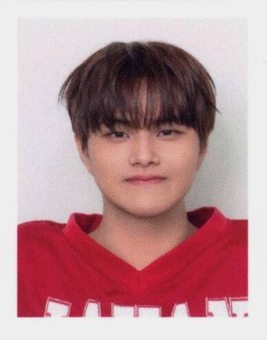 Small ID picture of Jahan in football gear