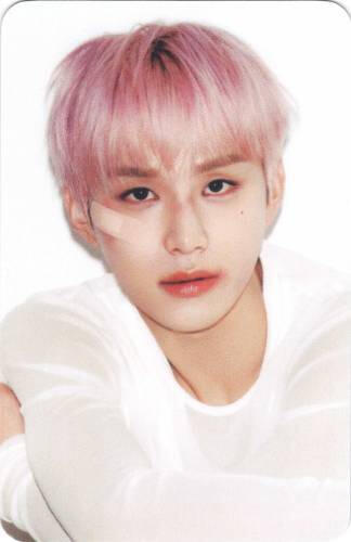 Photocard of Jungwoo staring into the camera with a bandaid on his face