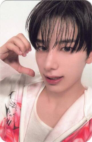 A photocard of Kunho Allhours making a cheek heart