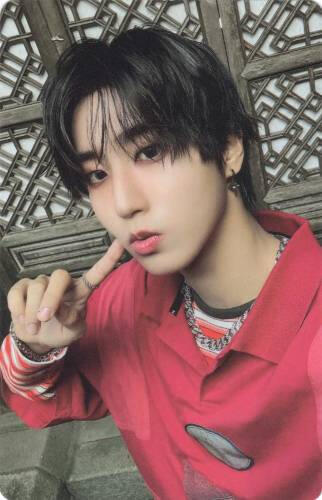 Photocard of Han poking his cheek