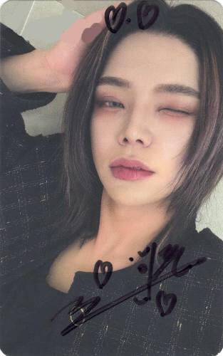 A signed photocard of Ijun from Waker winking