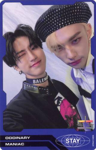 Photocard of Han and Hyunjin looking at the camera, Hyunjin is serious and Han is smiling
