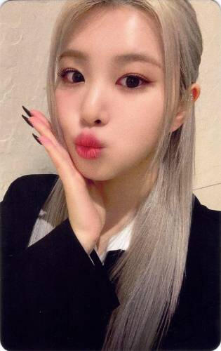 Photocard of Swan making a kissy face and holding her hand to her cheek