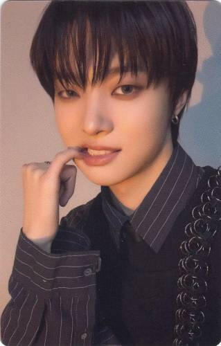 Photocard of Euijoo pulling his lips to the side to expose his teeth