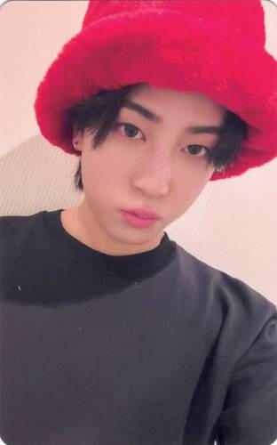 Photocard of Taki wearing a red bucket hat
