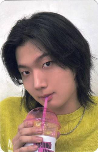 Photocard of Ganghun sipping a drink