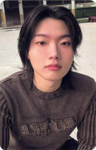 Photocard of Ganghun looking at the camera in a sweater